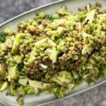 Lentil and broccoli vegan summer salad served on a rectangular platter