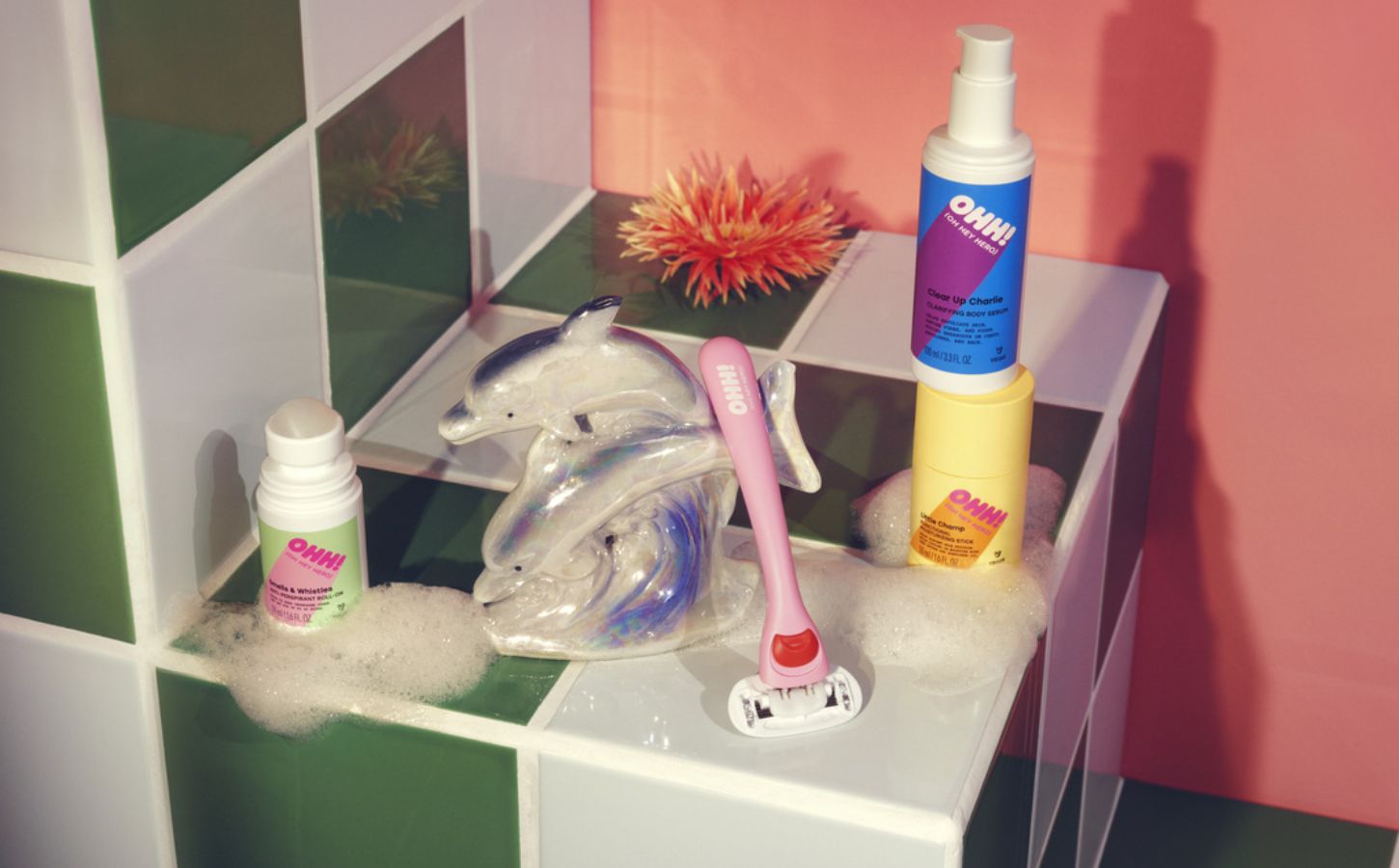 The new OOH! vegan beauty line from H&M shown in a bathroom setting with kitsch accessories