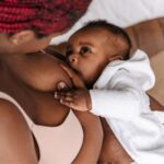 A vegan mother breastfeeding her baby