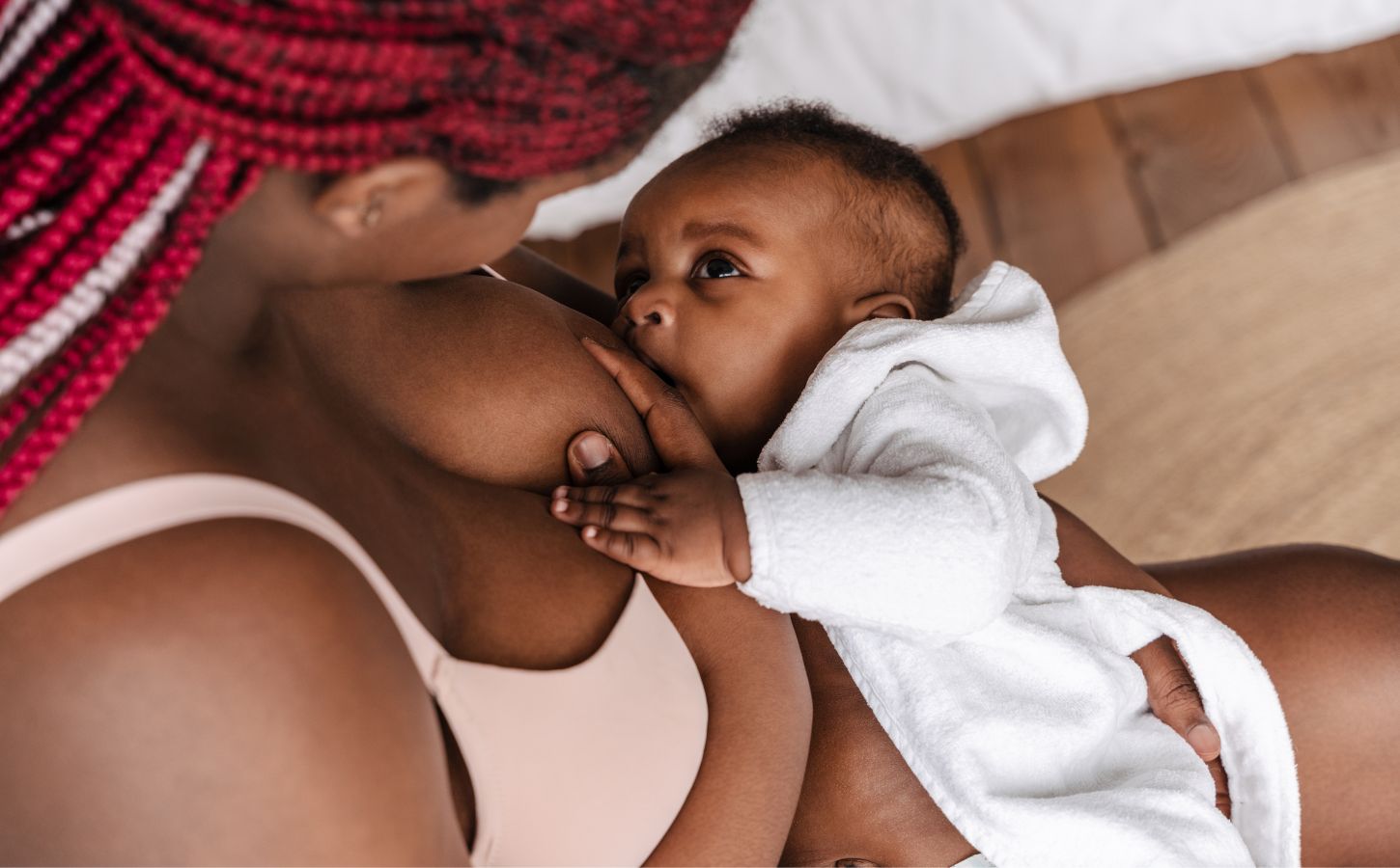 A vegan mother breastfeeding her baby
