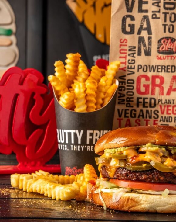 A plant-based burger, fries, and drink made by Slutty Vegan, just named one of Yelp's favorite burger chains