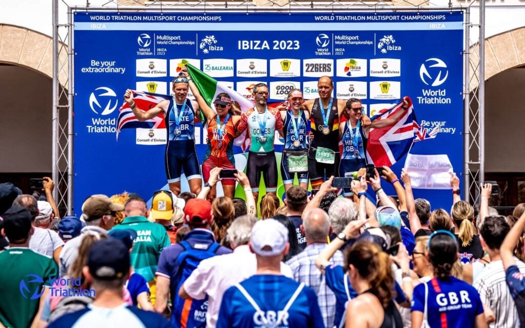 Vegan athlete Lisa Gawthorne with her podium mates at the Duathlon World Championships in Ibiza