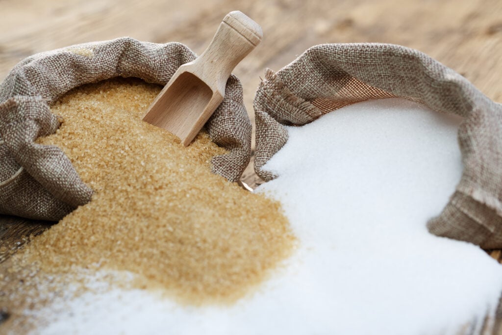 Sacks of white and brown sugar, which can both be made with bone char and not be vegan-friendly