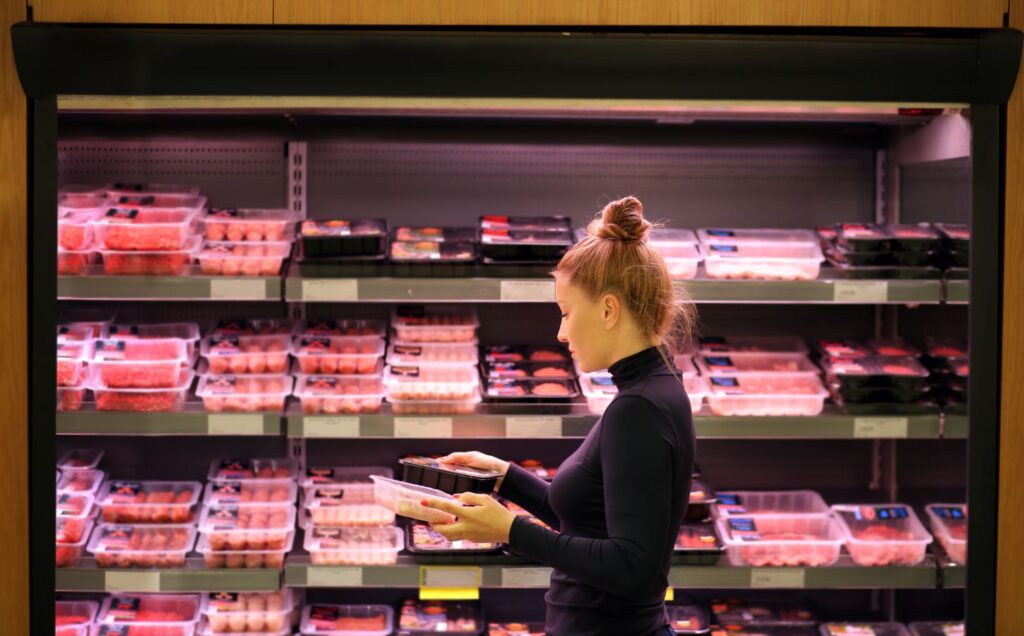 A person shopping for free-range chicken in the US