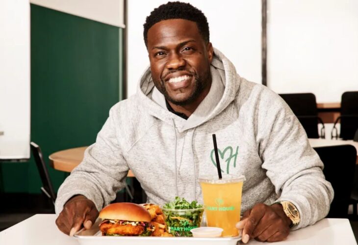 Plant-based celebrity Kevin Hart eating at Hart House, his vegan fast food restaurant chain