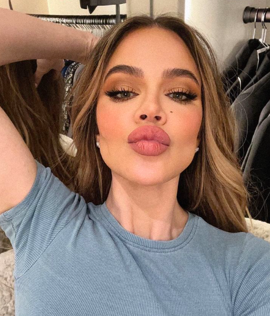 Celebrity Khloe Kardashian poses for a selfie