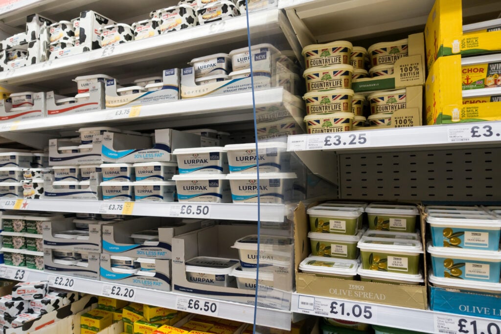 Supermarket shelves fllled with Lurpak spreadable butter