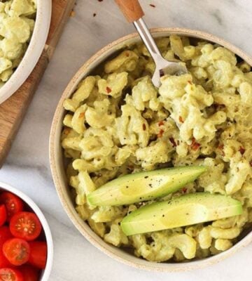 A bowl of creamy dairy-free mac and cheese made with all vegan ingredients, including avocado