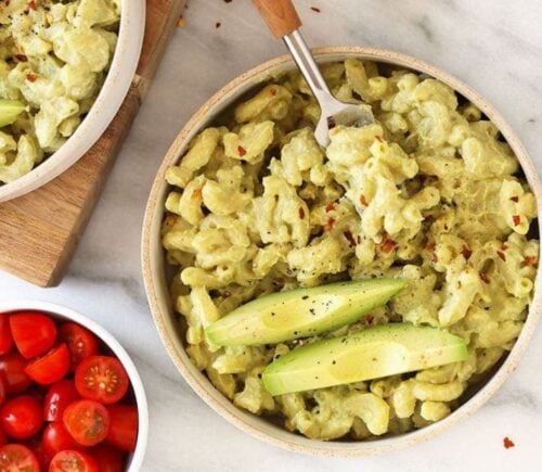 A bowl of creamy dairy-free mac and cheese made with all vegan ingredients, including avocado