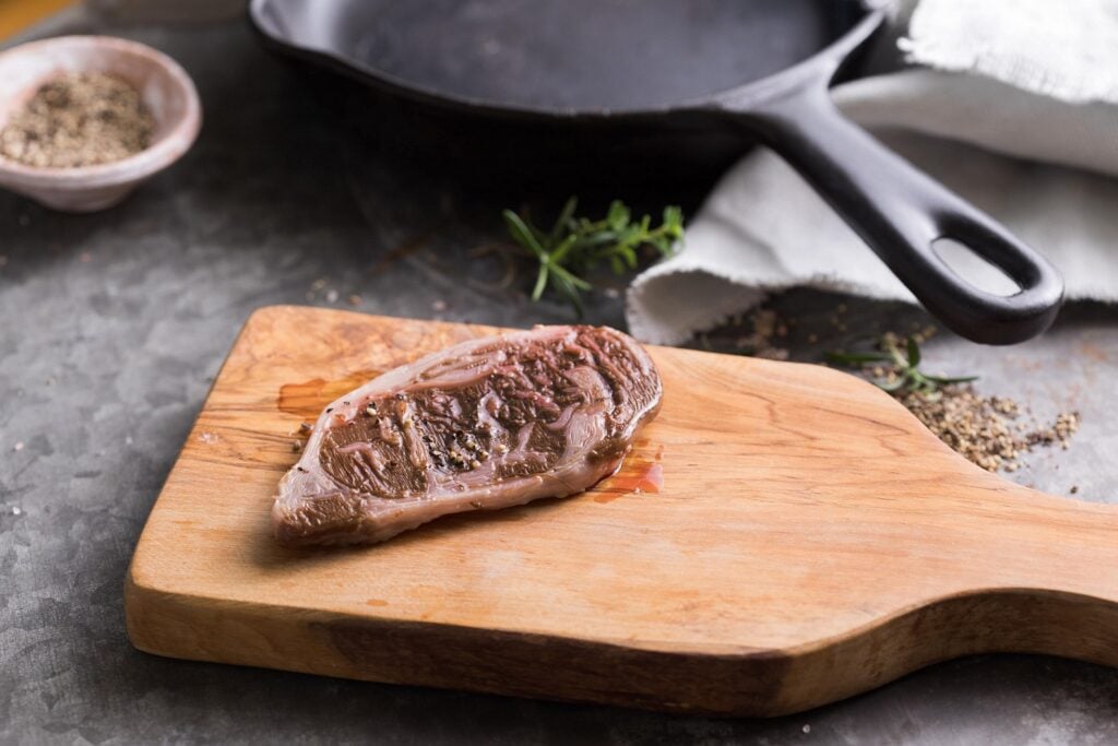 A cultivated beef steak by Aleph Farms on a chopping board
