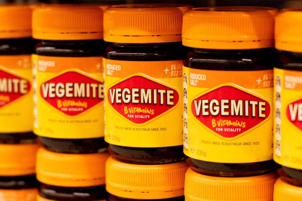 Jars of vegan-friendly spread Vegemite in a supermarket