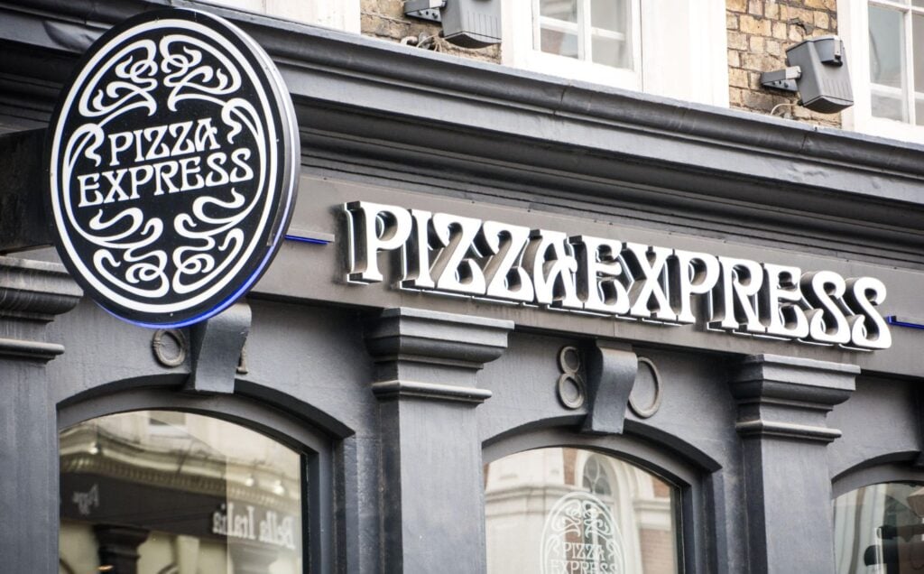 The outdoor sign of vegan-friendly UK chain restaurant Pizza Express