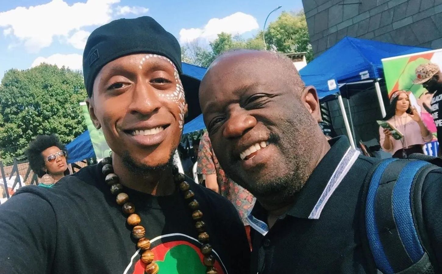 Music producer ADUM7 and vegan doctor Dr. Milton Mills at a previous Black VegFest event