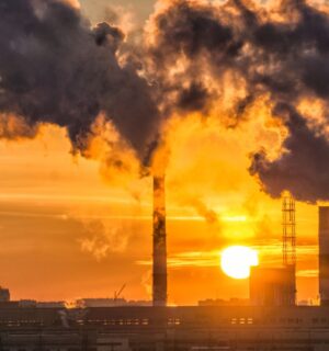 Fossil fuels burning in a factory, releasing environmentally damaging carbon
