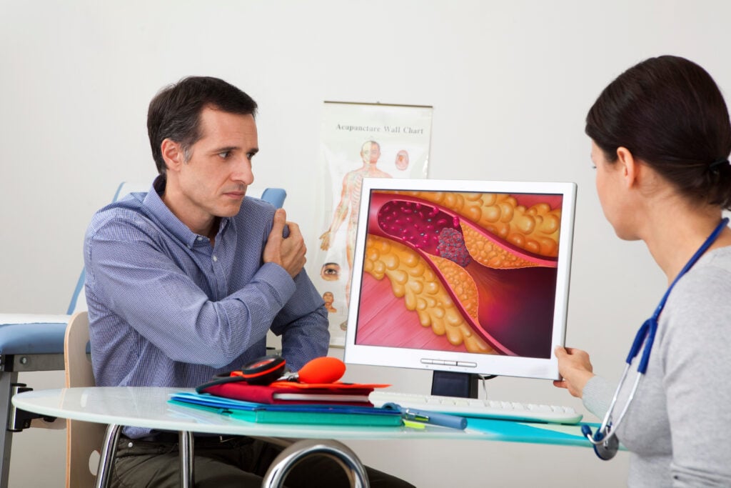 A man with high levels of cholesterol at the doctors' office