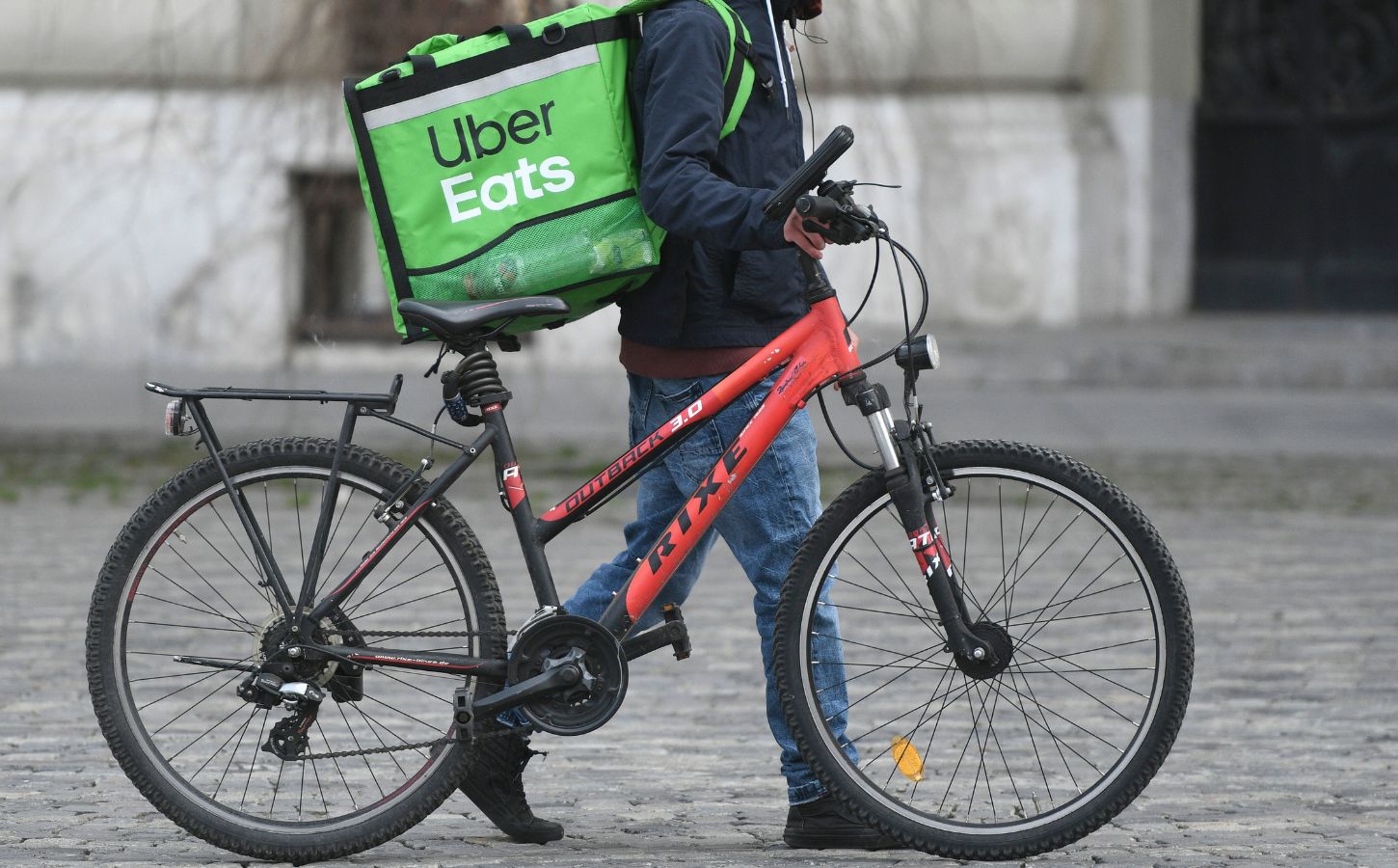 A delivery person for vegan-friendly takeaway service Uber Eats