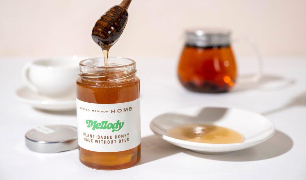 A jar of vegan Mellody honey, made without bees
