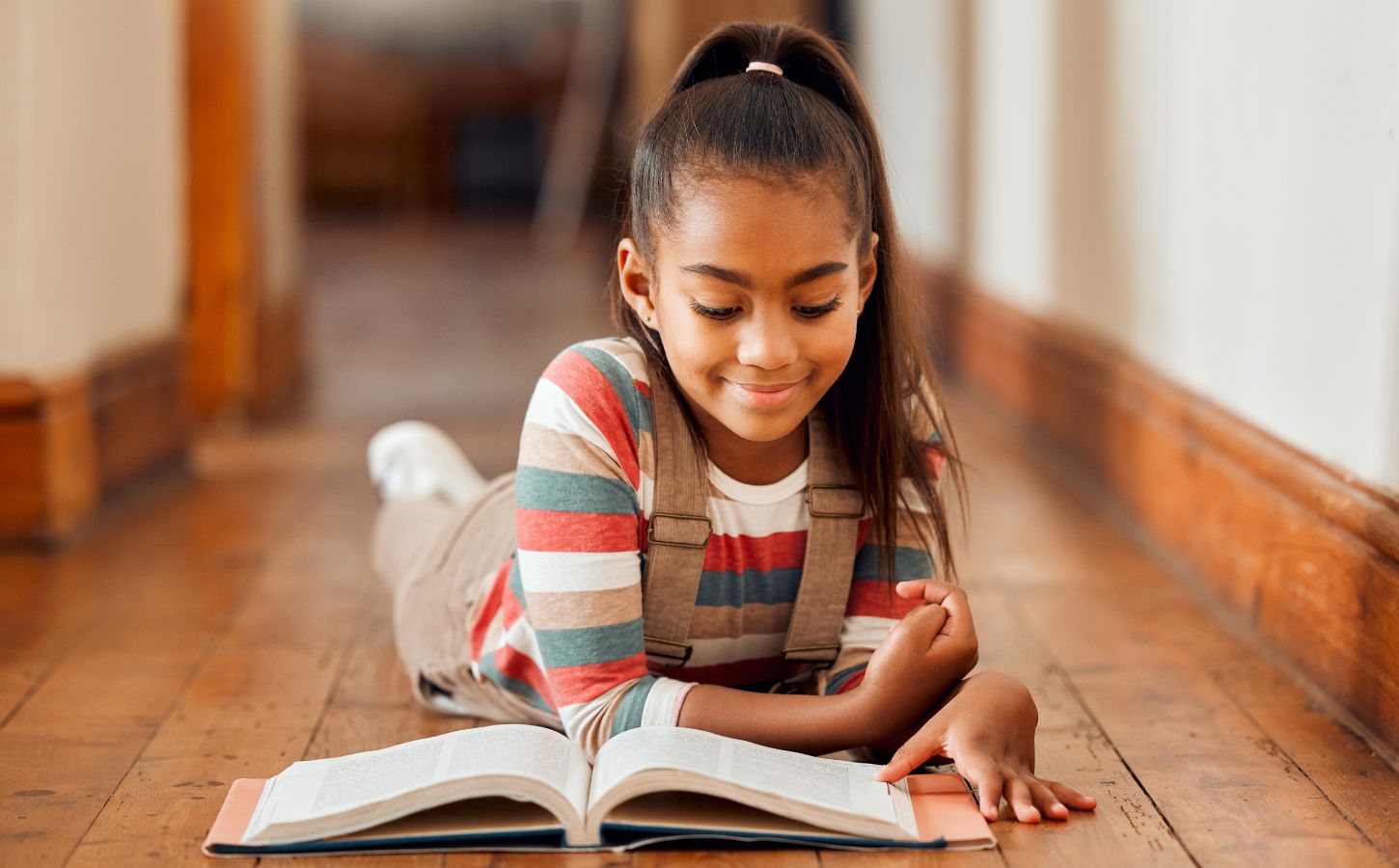 A child reading a vegan-friendly children's book