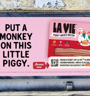 A billboard advertisement for La Vie’s new crowdfunding campaign. The ad features a packet of the brand’s vegan bacon rashers along with the message “Put a monkey on this little piggy.”