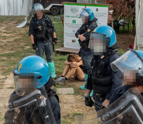 Italian police at a sanctuary where nine pigs were killed