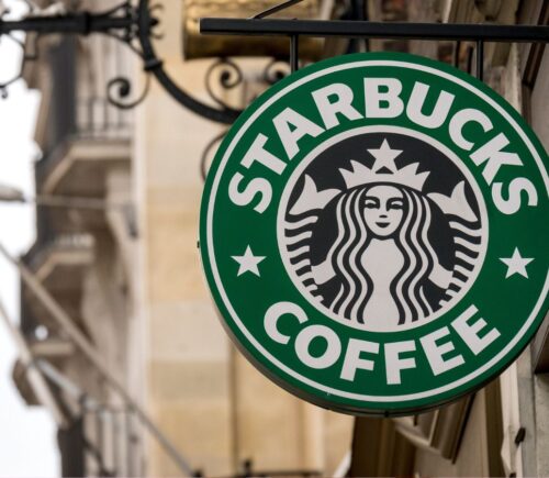 The outside of vegan-friendly coffee chain Starbucks, which has a vegan-friendly food and drinks menu