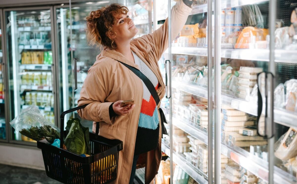 A person buying vegan food from a UK supermarket