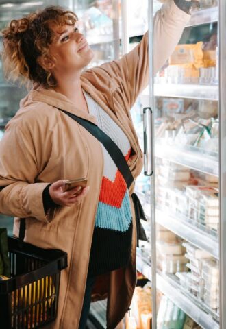 A person buying vegan food from a UK supermarket