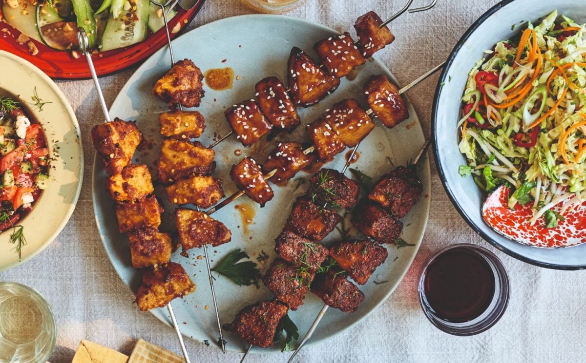 Vegan chicken skewers on a plate, a plant-based meat recipe from a new BOSH! cookbook