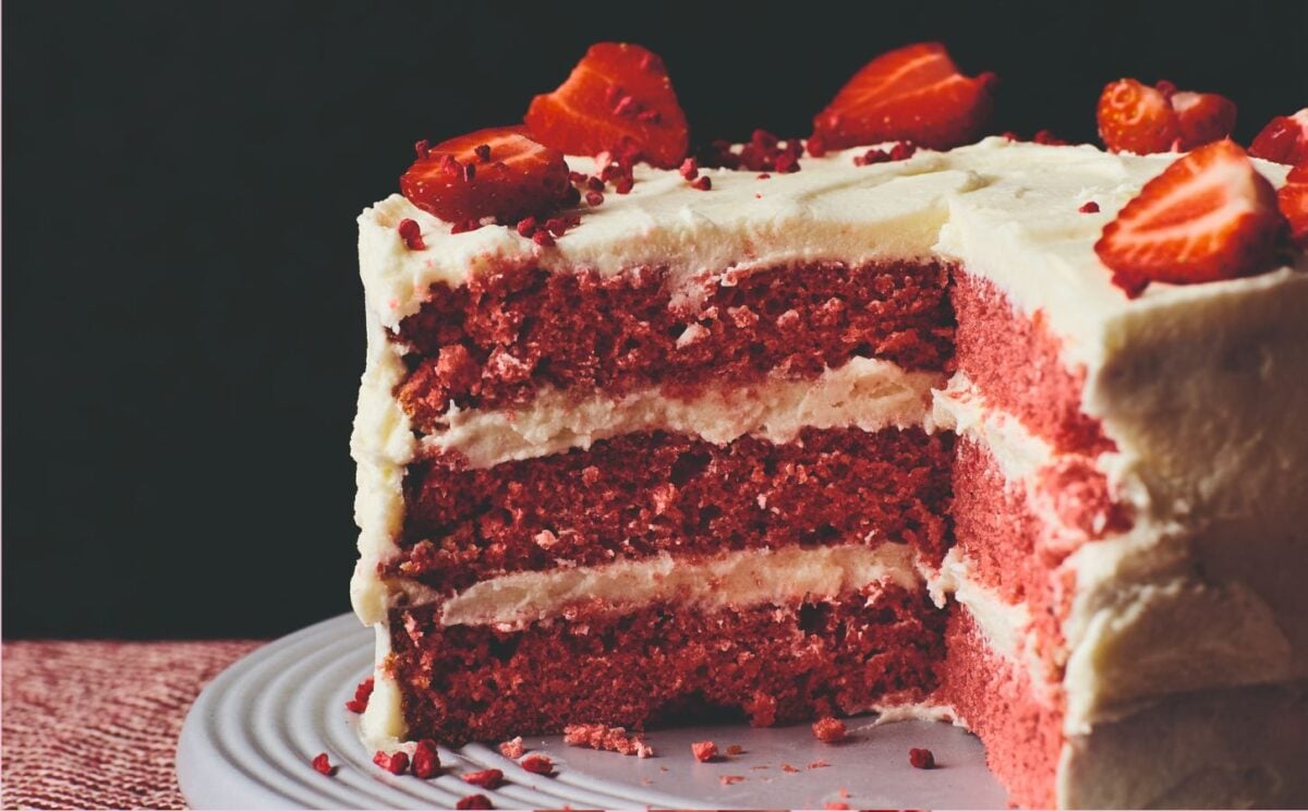 Close up shot of a vegan, dairy-free, and egg-free red velvet cake