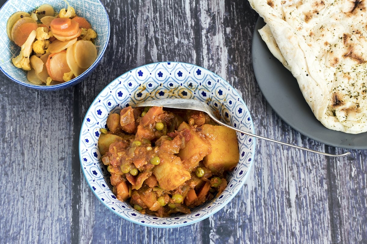 A root vegetable curry, a recipe using seasonal vegetables like carrots, swede, and potato