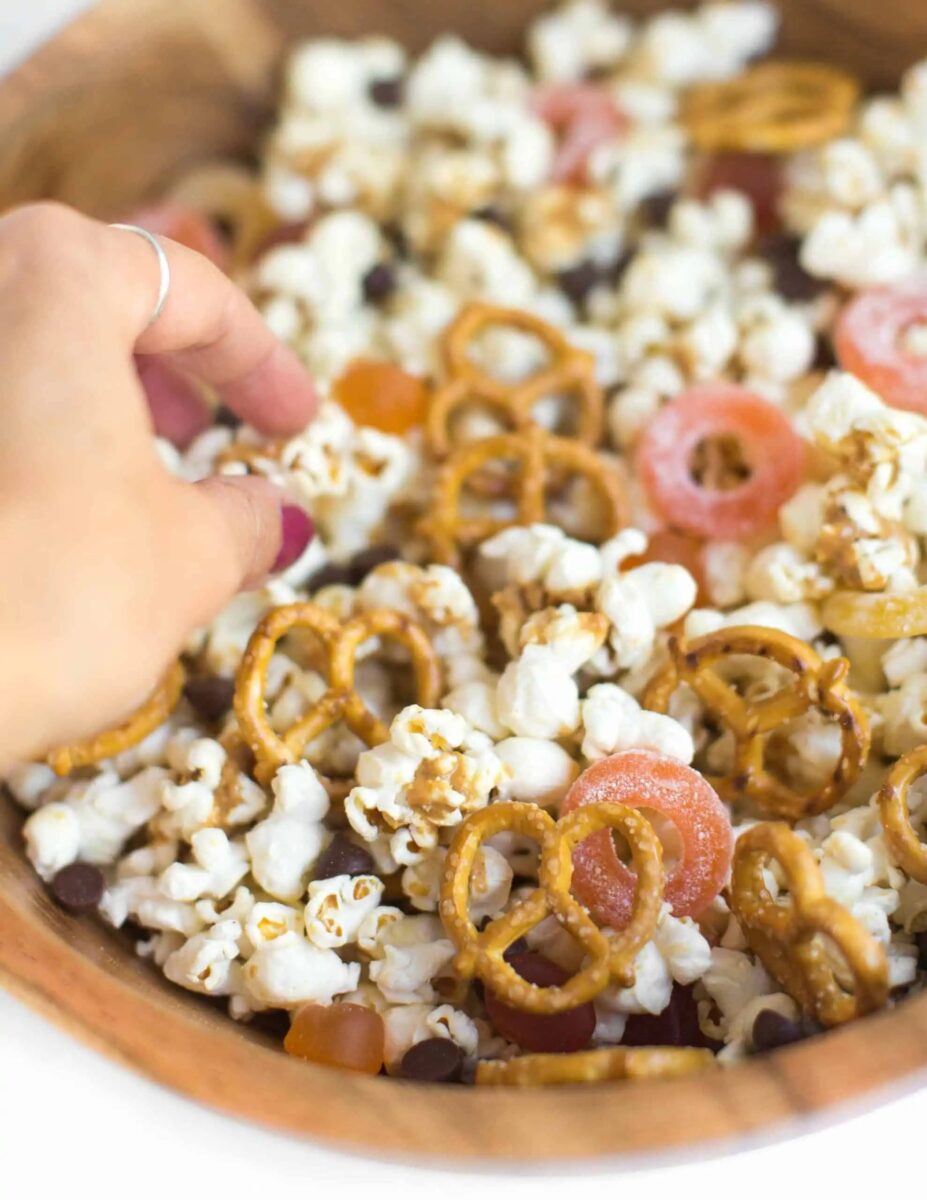 Peanut butter popcorn, a Halloween recipe containing pretzels, popcorn, and peanut butter