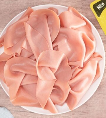 Heura's new cold cut additive-free vegan ham slices on a plate