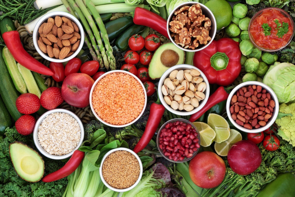 Aerial shot of colourful array of vegetables and plant-based foods that can lower risk of type 2 diabetes
