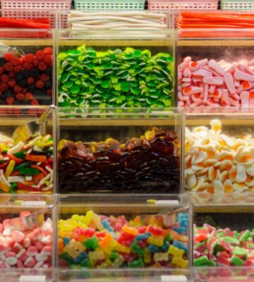 Wide shot of colorful pick and mix sweets with gelatin. Vegan sweets are available