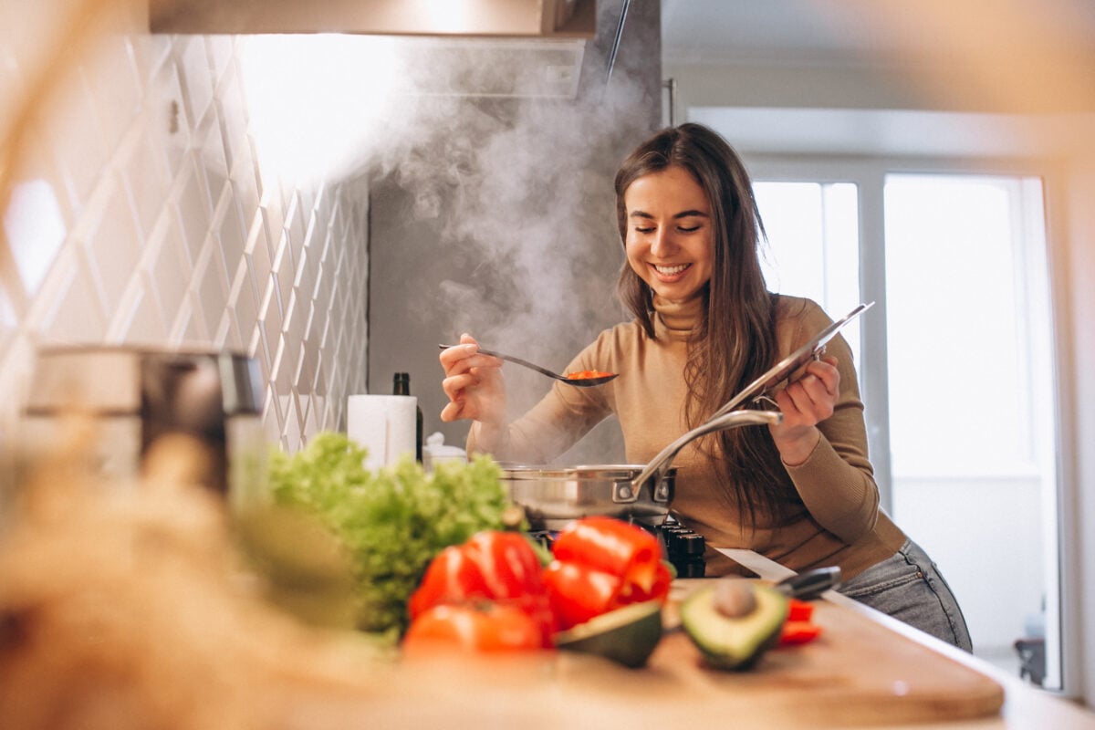 Woman cooking vegan food in Veganuary
