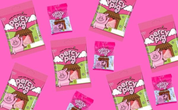 Packets of Percy Pigs on a pink background