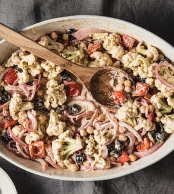 A vegan cauliflower casserole with a tahini sauce