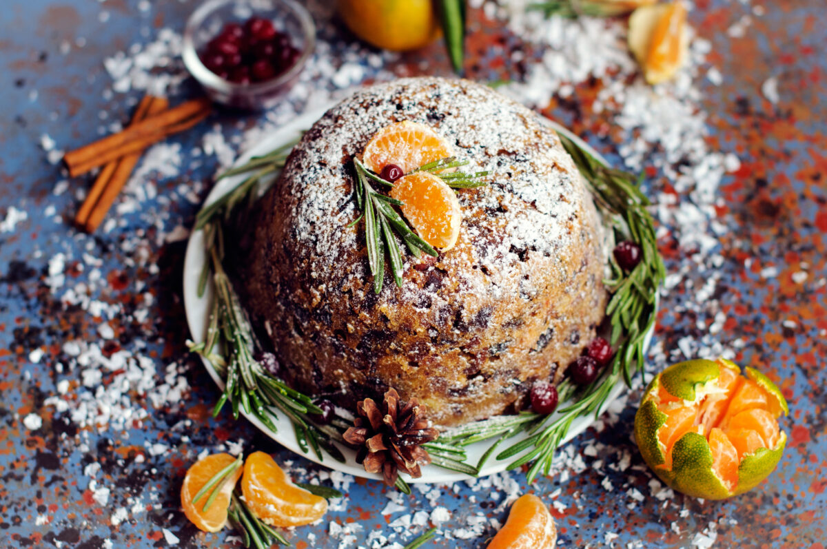 A christmas pudding with orange slices on top