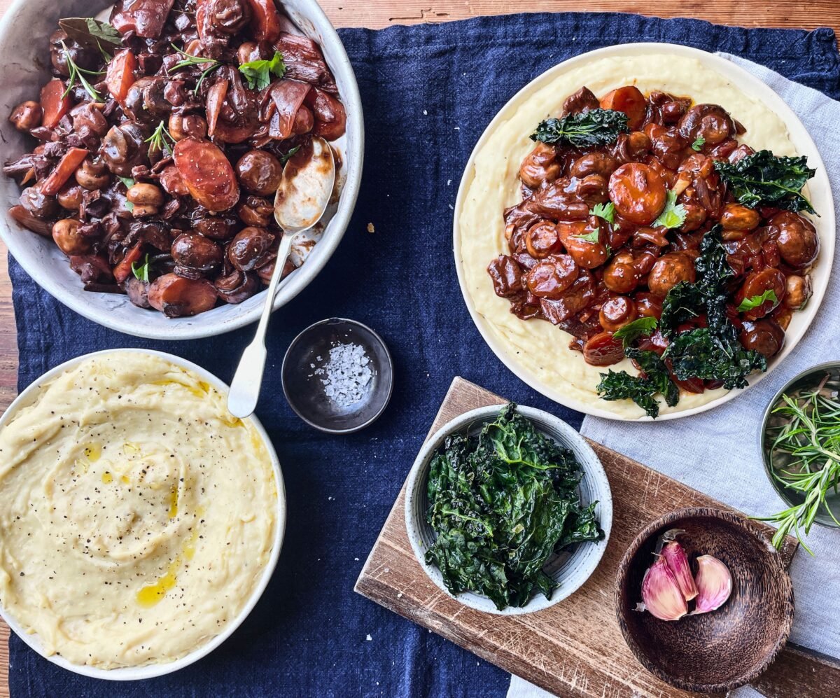 A vegan mushroom Bourguignon with white bean mash and kale chips