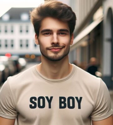 A vegan man wearing a t-shirt reading "soy boy"