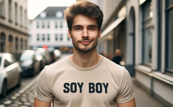 A vegan man wearing a t-shirt reading "soy boy"