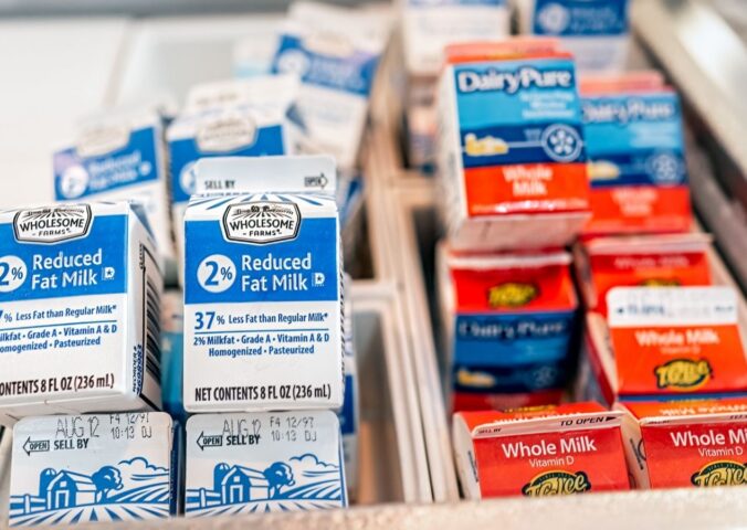 Cartons of milk in a school cafeteria