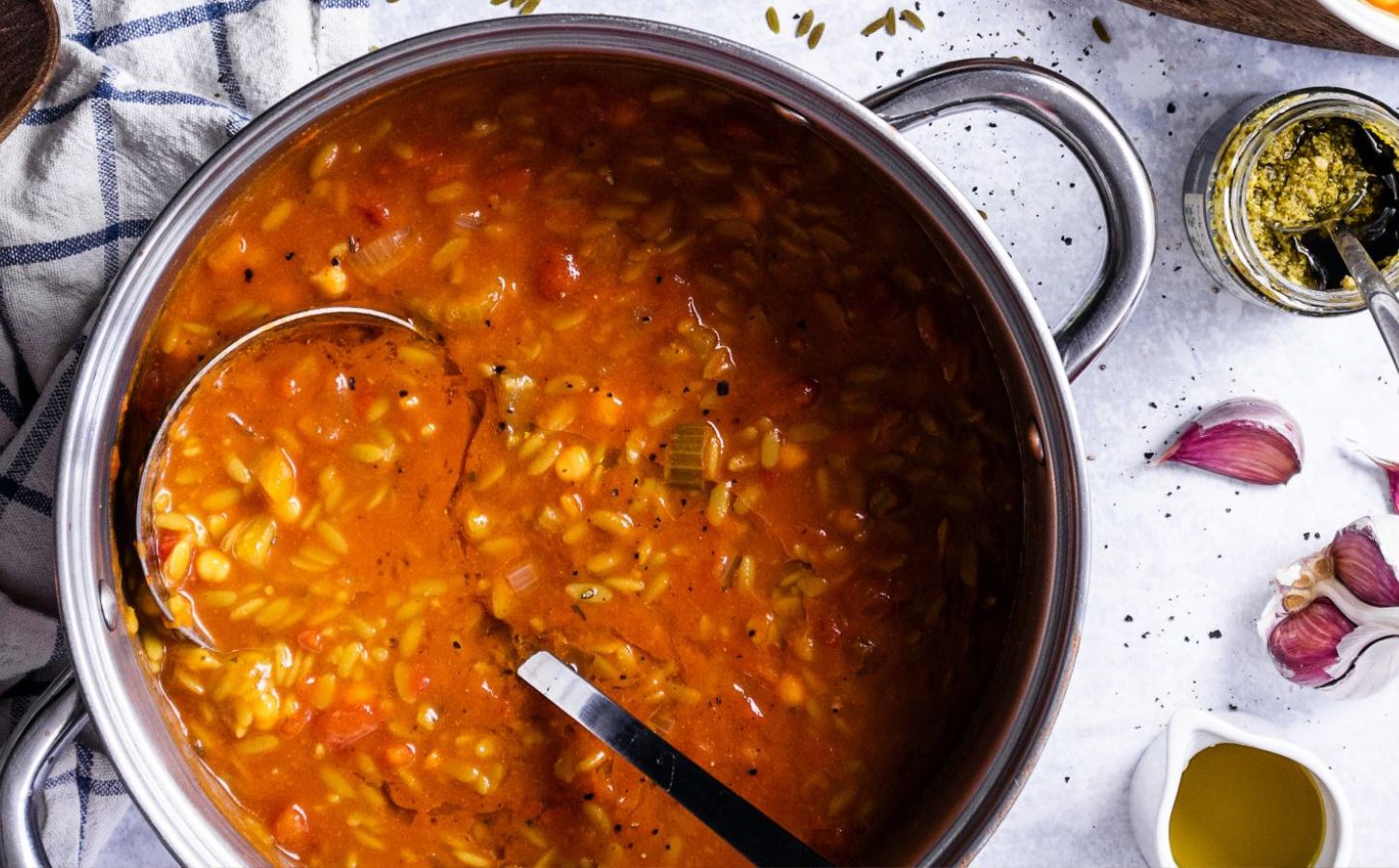 A vegan soup made with orzo pasta