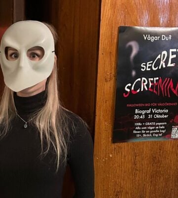 An animal activist wearing a mask at a secret screening of Dominion