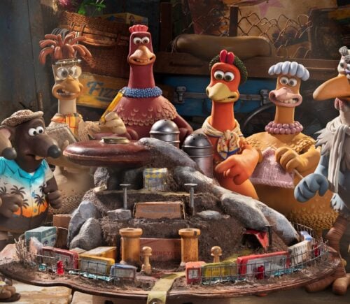 Chicken Run 2 characters look at model of Fun-Land Farms