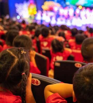 Children in the audience of a stage show