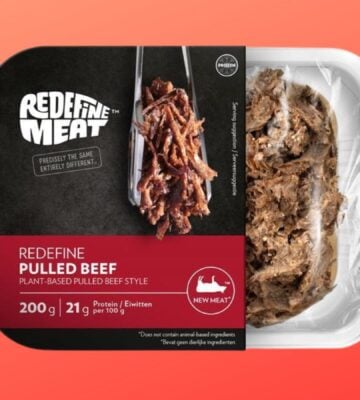 A packed of Redefine Meat vegan pork in front of a red background