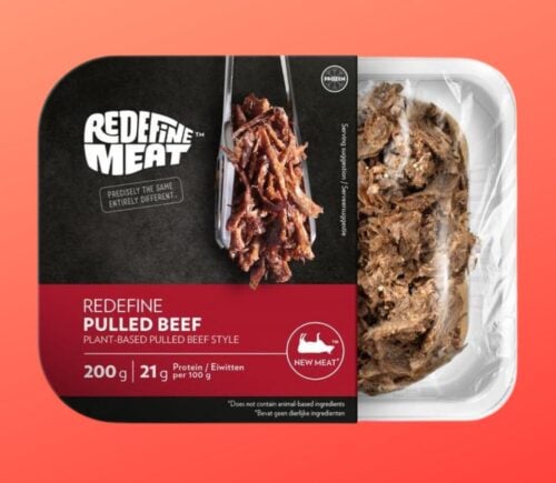 A packed of Redefine Meat vegan pork in front of a red background