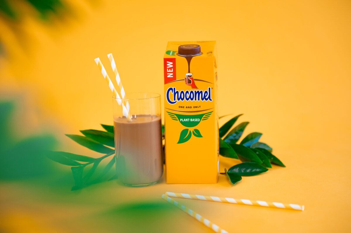 A bottle and glass of Chocomel Plant-Based