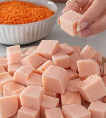 A plate of cubed red lentil tofu made from scratch